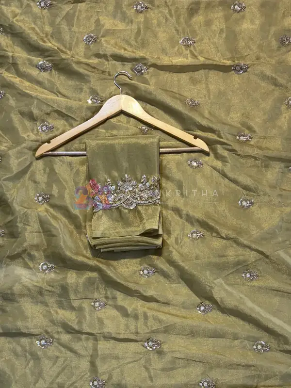 Gilded Radiance: Pure Tissue Silk Saree with Original Gold Beadwork